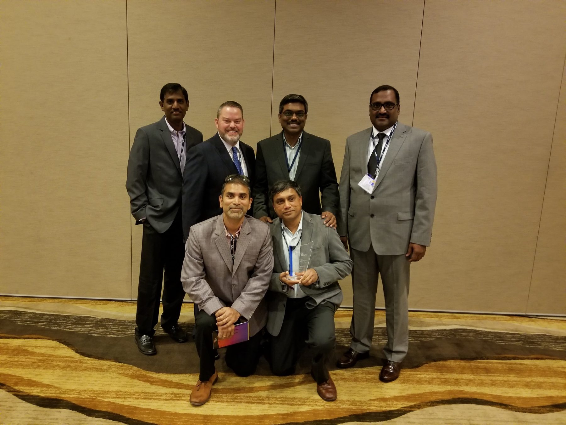 C-Vision team receiving a TMS partner award